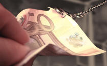Bild Geld an Kette